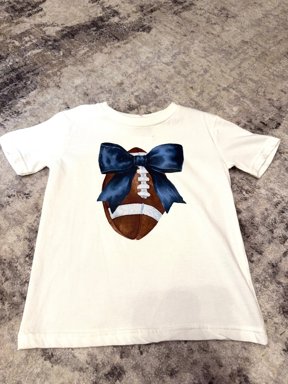 Football bow tee