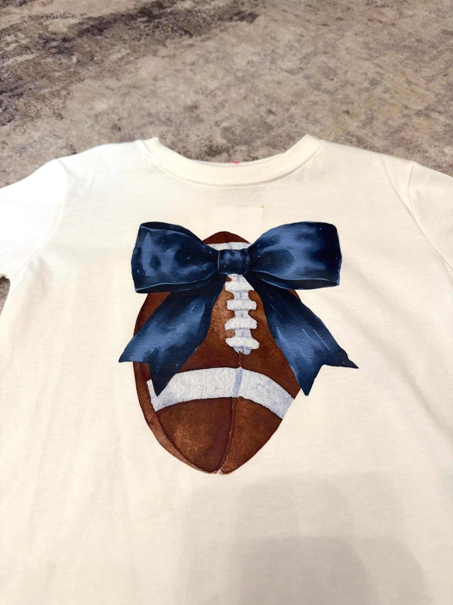 Football bow tee
